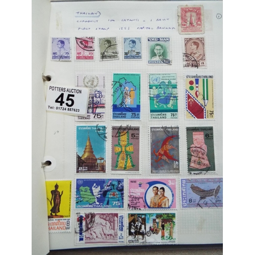 45 - Four small but well filled albums of World Stamps to include GB. See photos