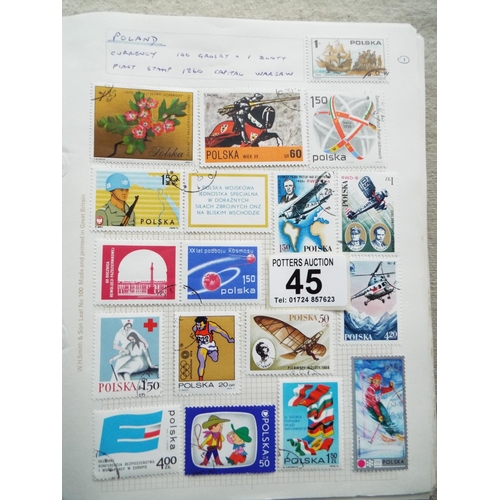 45 - Four small but well filled albums of World Stamps to include GB. See photos