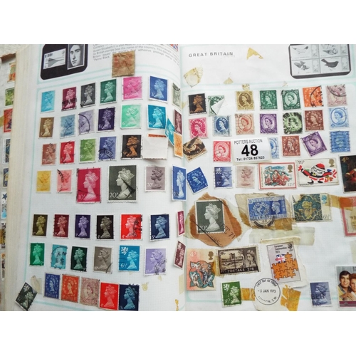 48 - Album of QEII Stamps, World album to include GB stamps, part filled plus empty album.  See photos