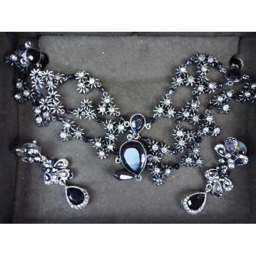 68 - Four good Quality statement costume necklace sets in boxes plus a large pair of 925 Silver ear hoops... 