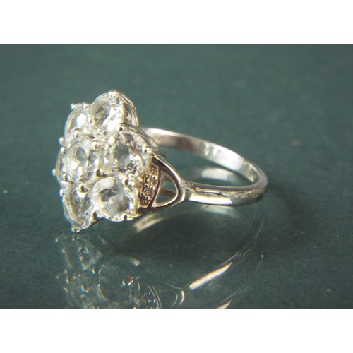 94 - 925 Silver CZ set flower style ring. Finger size 'R'