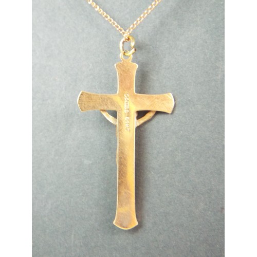 95 - 9ct Solid Gold Crucifix set on a 9ct yellow gold 18 inch chain. Total weight 4.0g