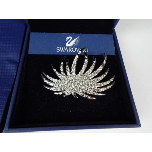 115 - Swarovski Crystal brooch with original branded box and gift bag.