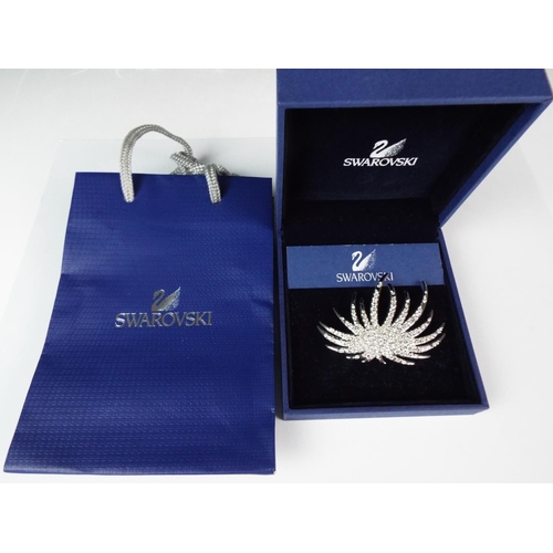 115 - Swarovski Crystal brooch with original branded box and gift bag.