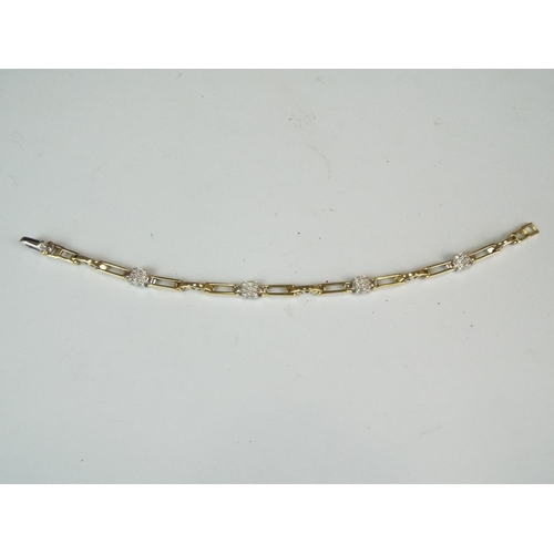 127 - 9ct Yellow Gold CZ set Link Bracelet. 10.2g