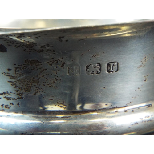 146 - Solid Silver bowl supported on three hoved feet.  Hallmarked for Birmingham 1916.    79.5g