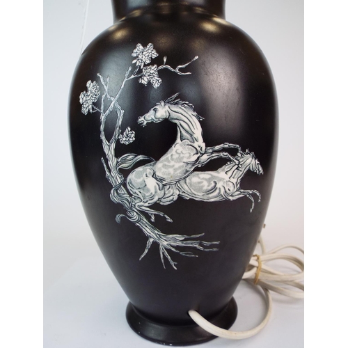 179 - 1930's Crown Devon Basalt lamp decorated with Transfer printed Oriental style Horses. 12 inches tall... 