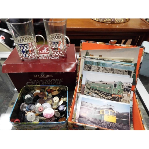 932 - Mixed lot to include glass coffee cups, tin of buttons, railway postcards