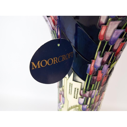 21 - Very large Trumpet shaped Moorcroft vase in the 'Town of Flowers' Design. Designed and signed by Ker... 