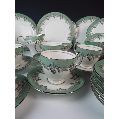 42 - Large almost complete Teaset by Aynsley in the Oak Leaf pattern. 50+ pieces.