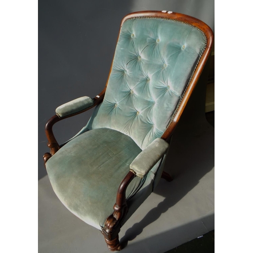 54 - Edwardian era upholstered armchair with original castors.