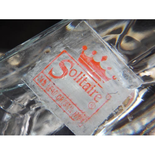 7 - Solitaire Lead Crystal model of Concorde standing on ebonised base. 9 inches long