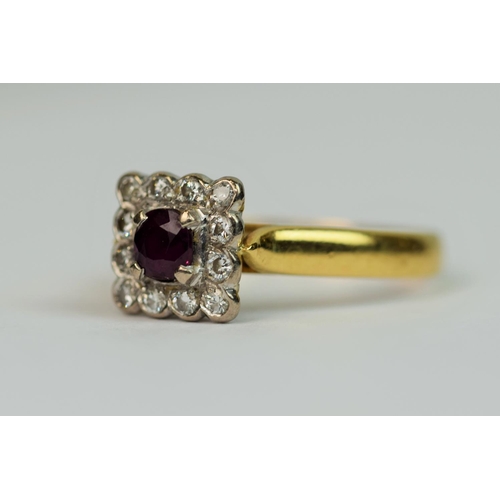 303 - 18ct Yellow Gold Art Deco style ring set with a  Central Ruby and Diamond surround.  Finger size 'O-... 