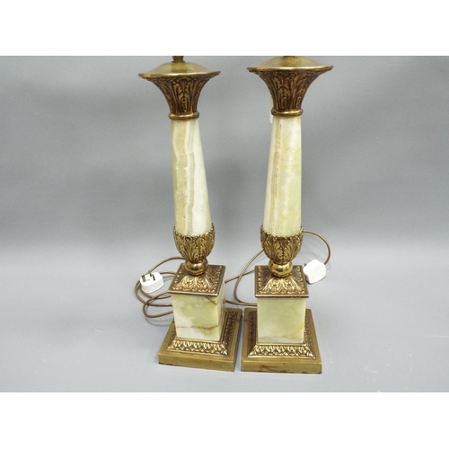 212 - 2 very large oynx and gilt table lamps with shades. 23 inches tall base to light fitting.