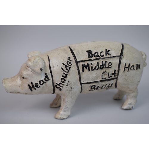 400 - Cast Iron Butchers Decorative Pig Money bank, 8 inches long. See photo