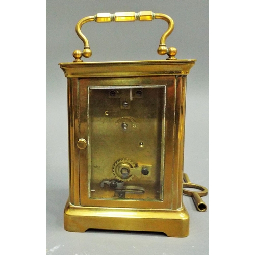 268 - Vintage brass carriage clock with skeleton movement in running order. Plus 1 other clock.