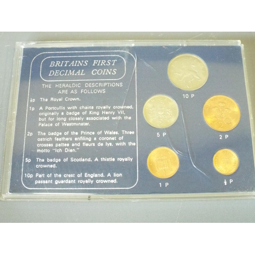 143 - 4 Sets of Britains first decimal coins and 1 set of Coinage of Great Britain. (6)
