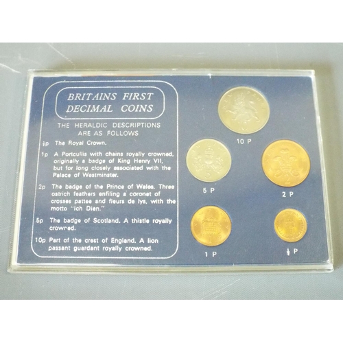 143 - 4 Sets of Britains first decimal coins and 1 set of Coinage of Great Britain. (6)