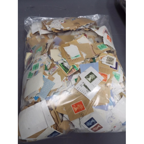 310 - 2.2kg of world and GB loose stamps