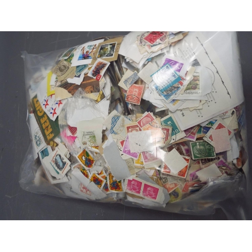 311 - 2.4kg of world and GB loose stamps