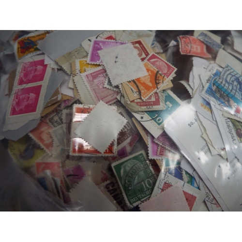 311 - 2.4kg of world and GB loose stamps