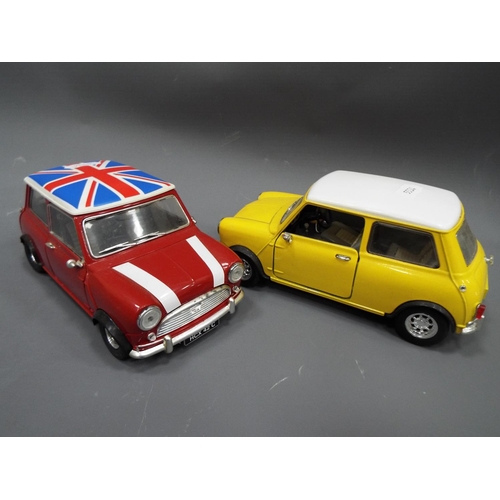 404 - Two Solido 1:16 Scale die cast Mini Coopers. Both boxed and unused condition. See photo