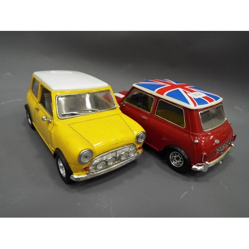 404 - Two Solido 1:16 Scale die cast Mini Coopers. Both boxed and unused condition. See photo