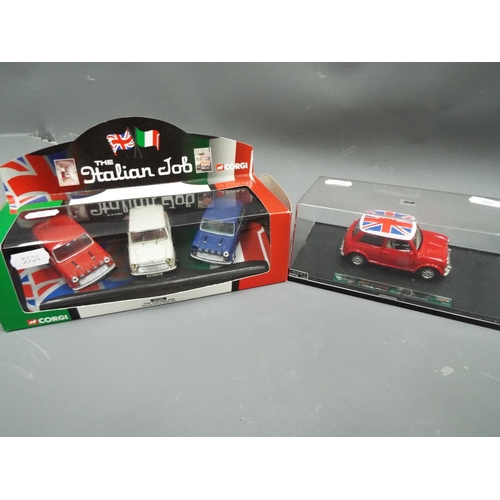 405 - New Ray die cast model of a Mini cooper set in a perspex box together with a Corgi Italian Job, thre... 