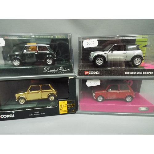 406 - Four die cast models of Mini Coopers. All boxed and unused. See photos.