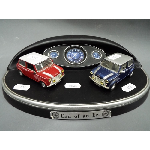 407 - Corgi, End of an era display with two die cast Mini Coopers and display plaque . No Box. See photo