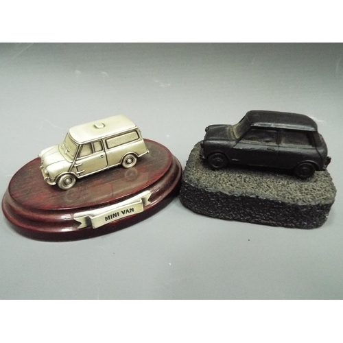 411 - Two desk top models of Minis, one crafted from Welsh Coal. See photos