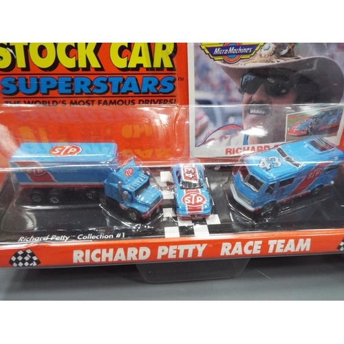 412 - Two as new and carded micro machines, Stock cars and Superstars Babylon 5 Space Vehicles. See photos