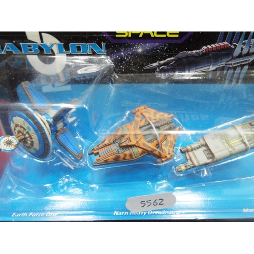 412 - Two as new and carded micro machines, Stock cars and Superstars Babylon 5 Space Vehicles. See photos