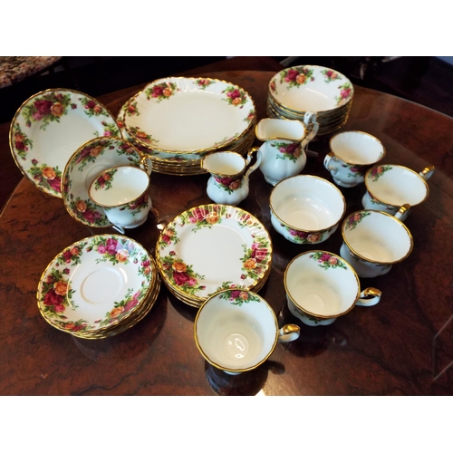 42 - Selection of Royal Albert old country dinner ware 36 pieces .