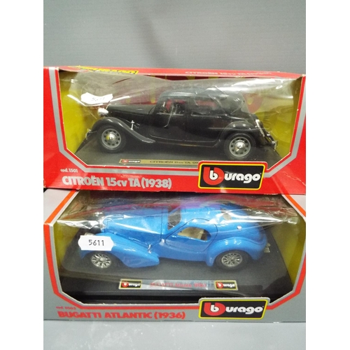 430 - Two Die cast metal Burago vintage cars plus a Range Rover Safari Set. All boxed and unused, see phot... 