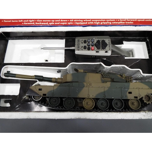 447 - Boomer tank R/C Battle tank. Battery and charger appear to be missing. Original box. See photos.