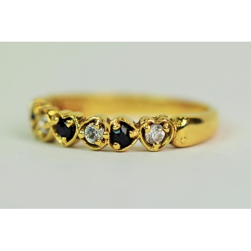 504 - 9ct Yellow Gold half eternity ring set with seven Sapphires & CZ's in heart shaped mounts.  Finger s... 