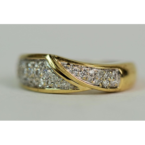 520 - 9ct Yellow Gold wave pattern ring set with Multiple Diamonds of approx 0.4cts.  Finger size 'N'  3.6... 