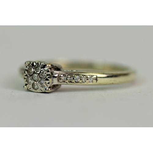 522 - 9ct White Gold Deco Style Ring set with 17 Diamonds each of approx 1/50th of a ct. finger size 'L'  ... 