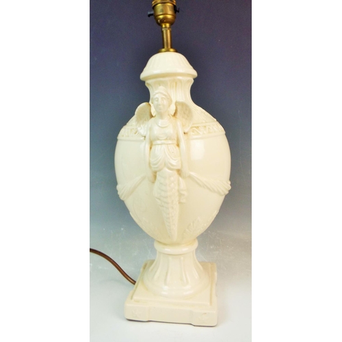 62 - Royal Creamware table lamp with mythical ladies to each side.