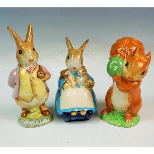 97 - 3 Beswick Beatrice Potter figurines, Mr Benjimin Button , Squirrel Nutkin, Mrs Rabbit and bunnies.