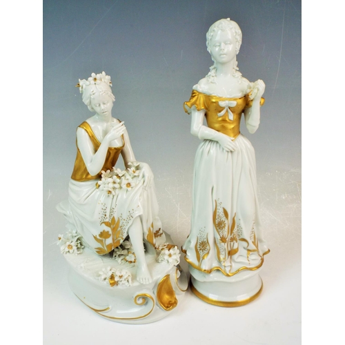 98 - A Pair of Capodimonte white and gold figuirines.