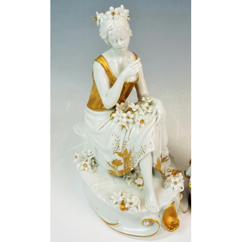 98 - A Pair of Capodimonte white and gold figuirines.