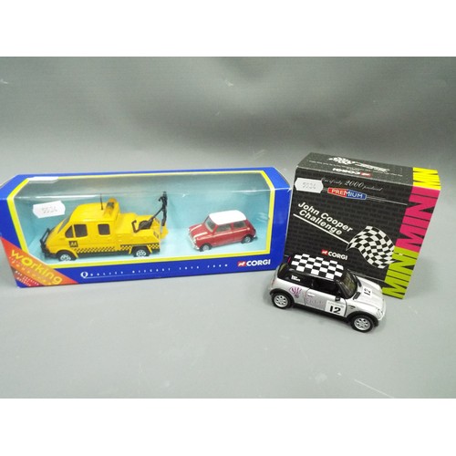 402 - Corgi ltd Edition die cast model of a John Cooper challenge Mini Cooper together with a Corgi road r... 