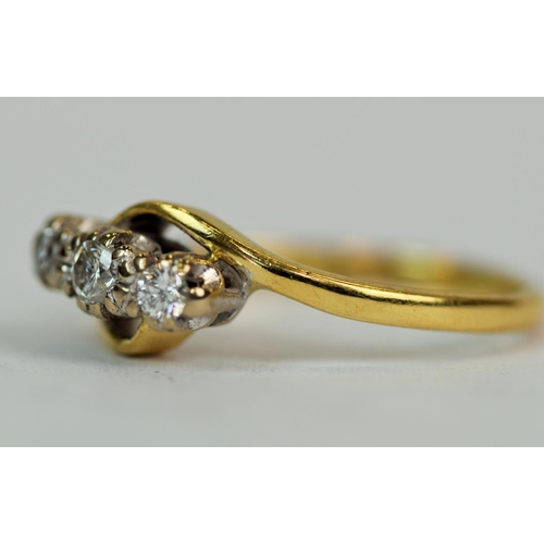 531 - 18ct Yellow Gold Ring set with Triple Diamonds. Centre Diamond 0.10cts with both side Diamonds at 0.... 