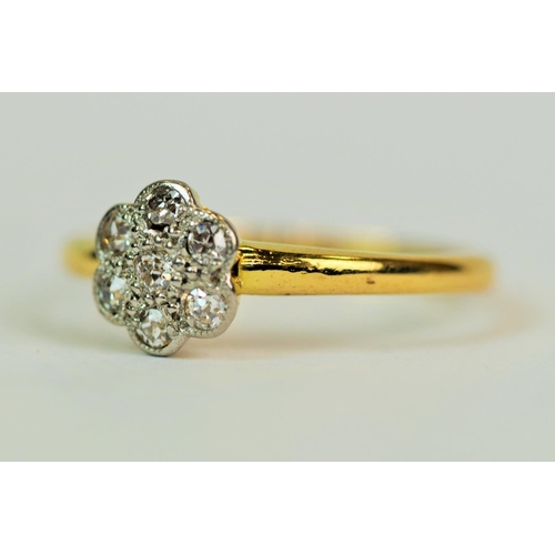 536 - 9ct Yellow Gold Ring set with 7 Diamonds in a flower pattern. Consists of 7, 2mm Diamonds each appro... 