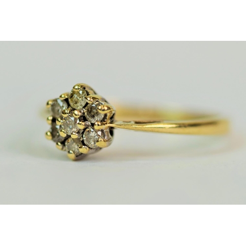 537 - 9ct Yellow Gold Ring set with 7 Diamonds in a flower pattern. Approx 0.25ct Diamonds.  Finger size '... 