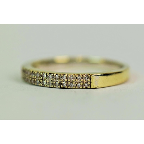 548 - 9ct White Gold Half Eternity Ring set with approx 0.10pts of Diamonds.  Finger size 'M'    2.1g