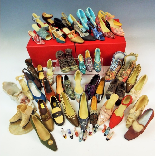 117 - A Large selection of decorative shoes 