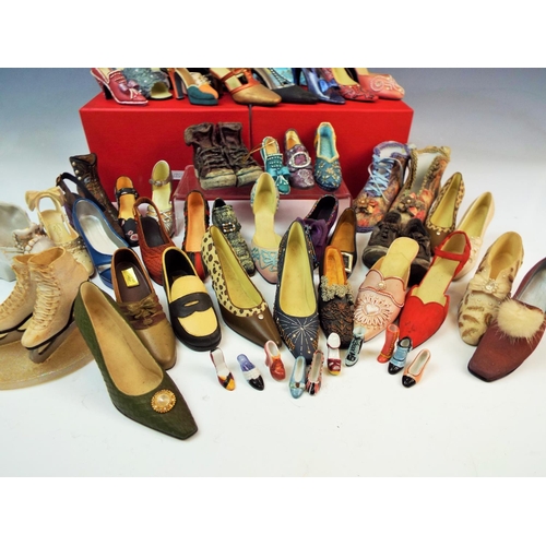 117 - A Large selection of decorative shoes 